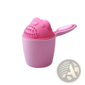 Pink plastic baby shampoo rinse cup with frog-shaped lid, circular drainage holes, and integrated handle for bathing