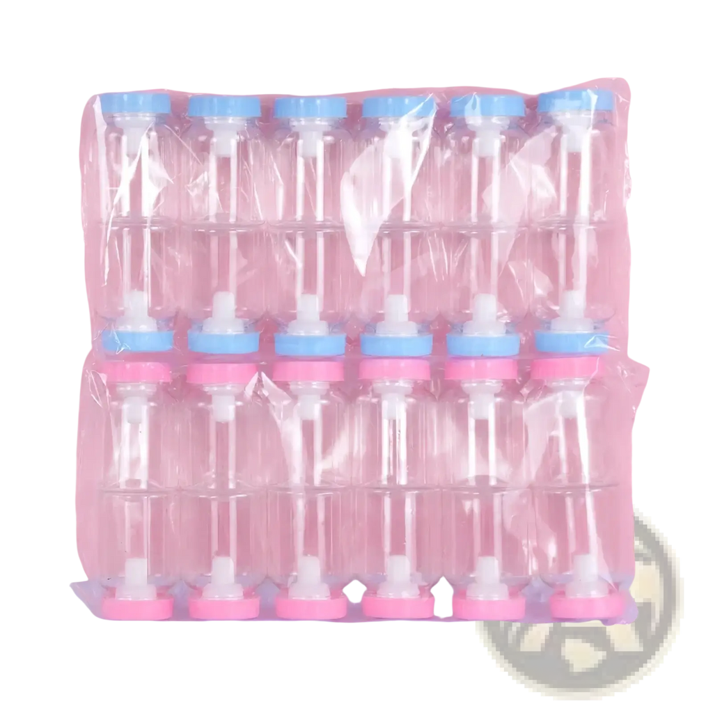 Clear plastic baby shower favor bottles with blue and pink caps arranged in a grid inside transparent packaging