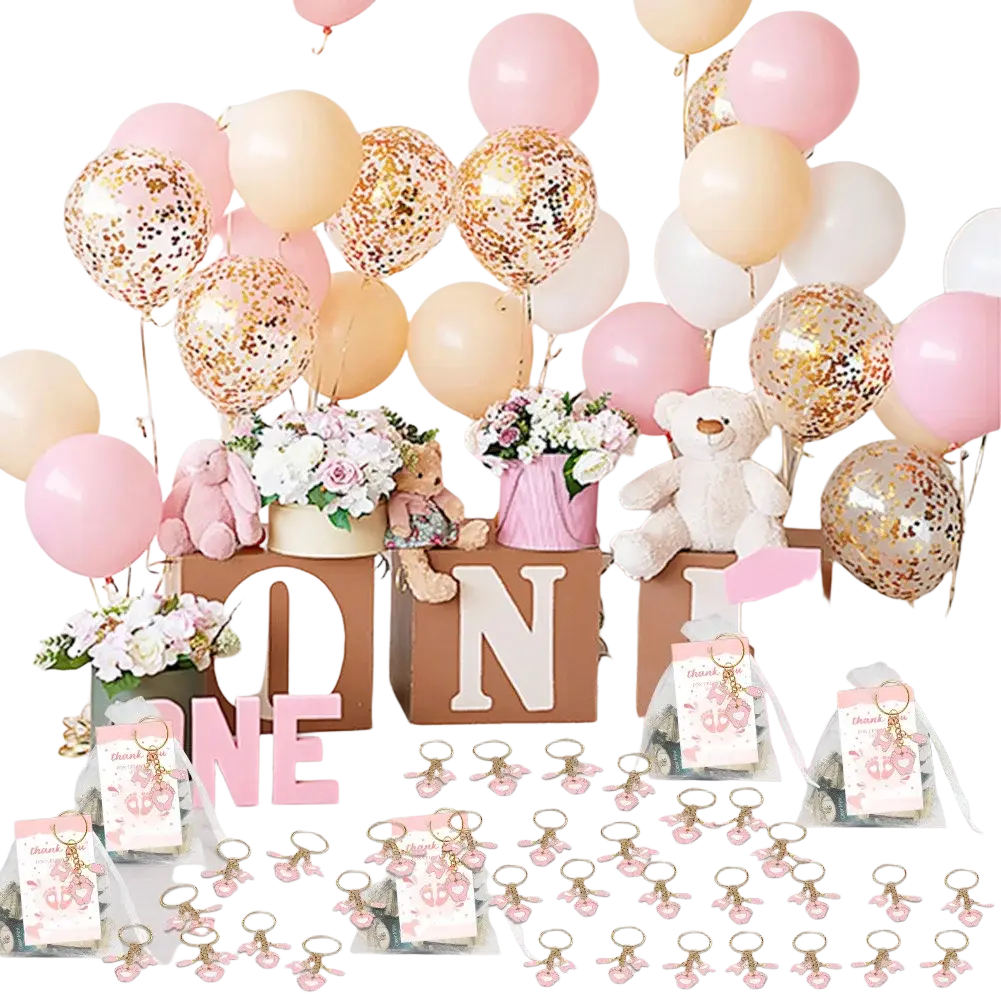 Pink bunny keychains with gold-tone metal rings and pink enamel details for baby shower footprint party favors