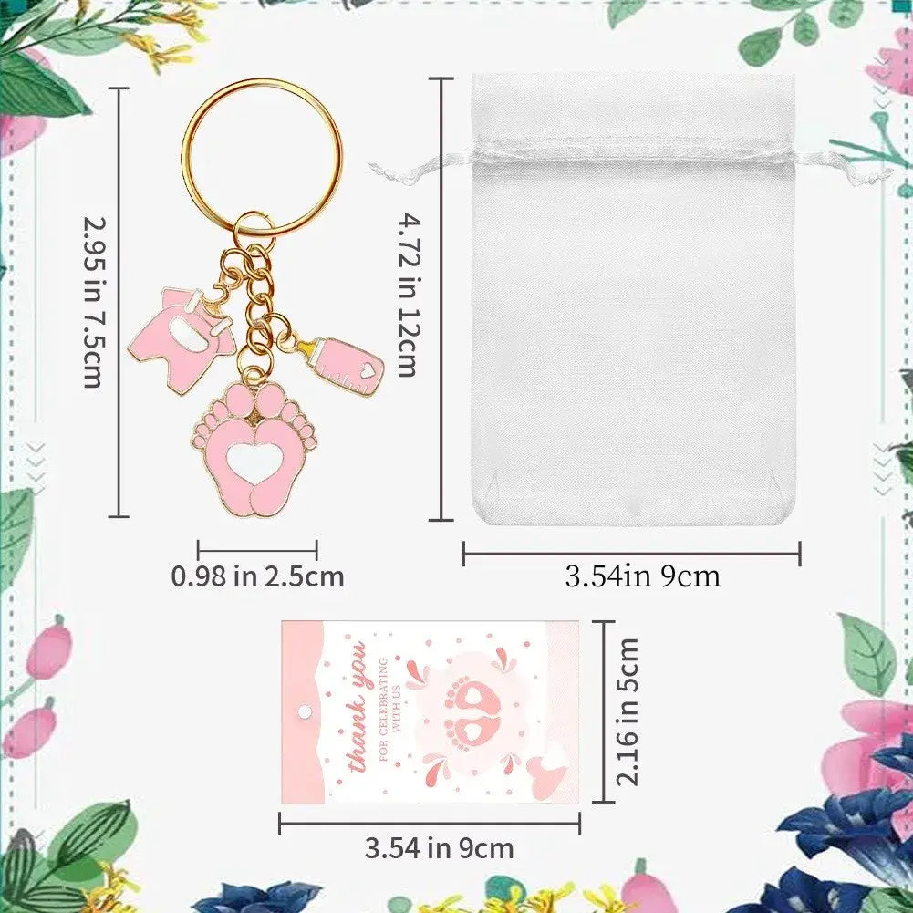 Pink enamel baby shower footprint keychain with gold-toned metal ring and charms for party favors