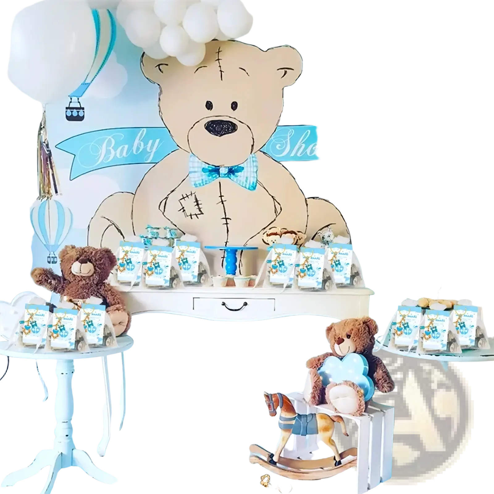 A plush brown teddy bear with a blue and white checkered bow tie holding a small gift bag for baby shower favors