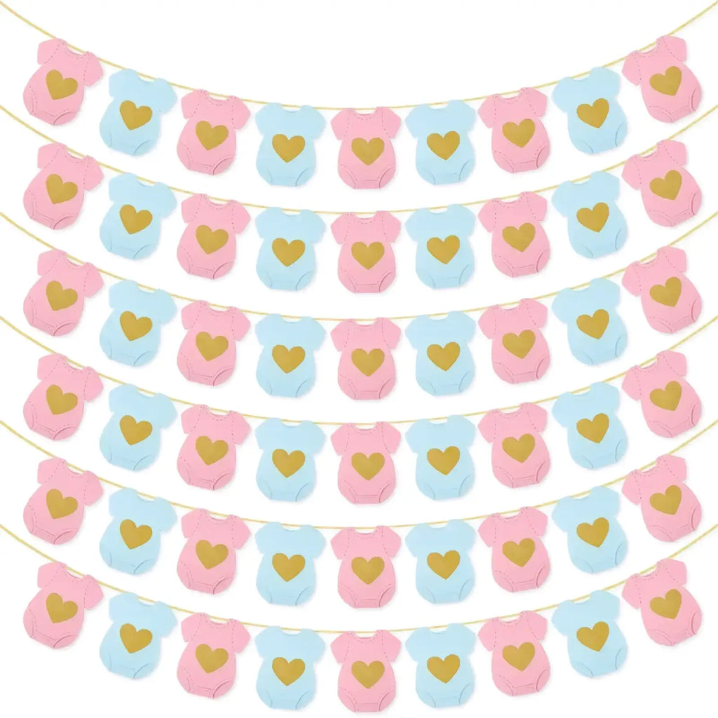 A baby shower onesie paper garland with alternating pink and light blue cutouts each featuring a gold heart