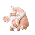 Pink textured plush bunny-shaped baby comforter with white trim and embroidered musical notes for sleep aid