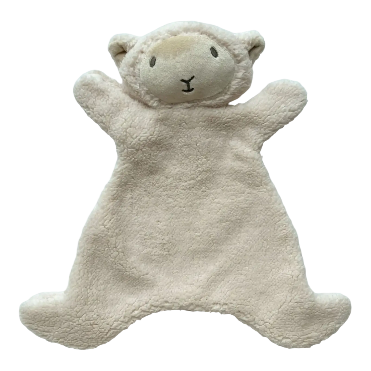 Cream-colored plush sheep-shaped comforter with soft textured fabric and embroidered facial features for baby photography