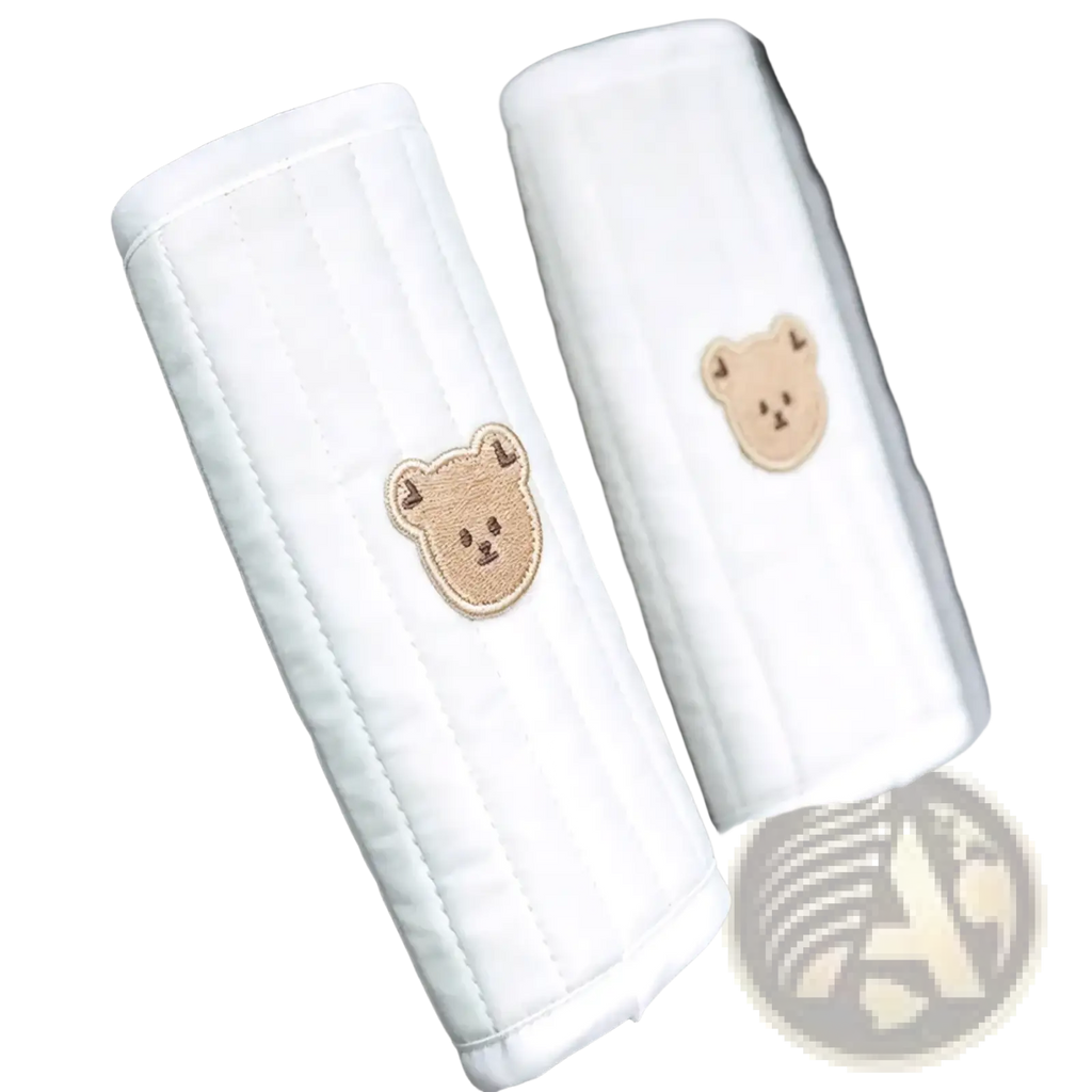 White quilted car seat belt protectors with embroidered beige bear faces for baby stroller accessory set
