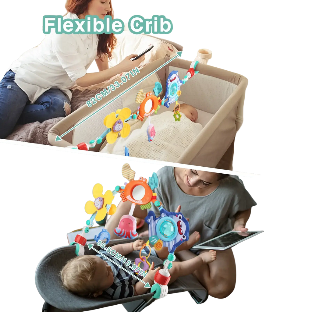 Flexible baby stroller arch toy with colorful soft plastic animal and flower attachments on stretchy cord ocean theme