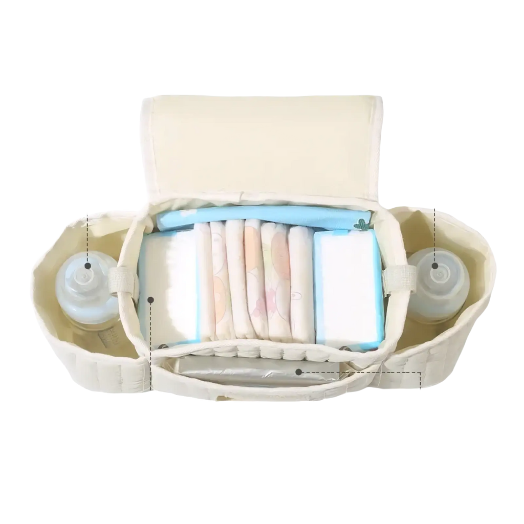 Beige quilted baby stroller organizer bag with teddy bear patch and compartments for bottles diapers and wipes