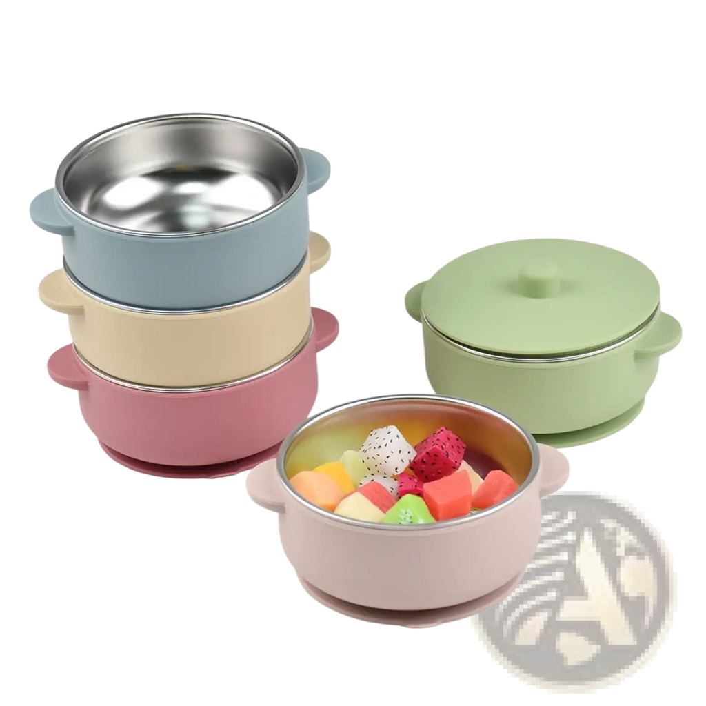 Pastel pink silicone-lined stainless steel baby training bowl with suction base and rounded handles for weaning