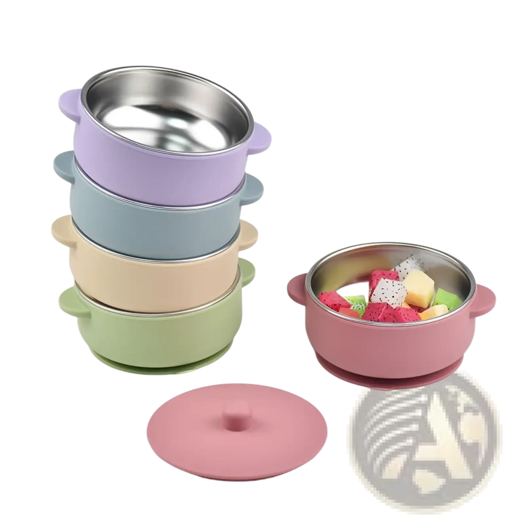 Pastel pink baby training bowl with stainless steel interior silicone exterior and suction base for weaning meals