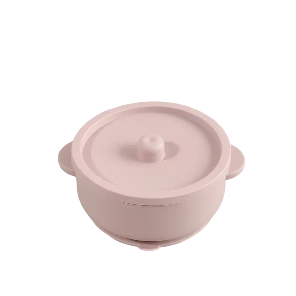 Pink silicone baby training bowl with rounded handles, matching lid, stainless steel base for weaning use
