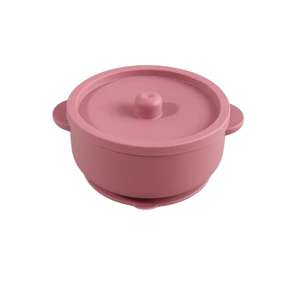 Pink silicone baby training bowl with rounded handles and matching lid for weaning stainless steel dish