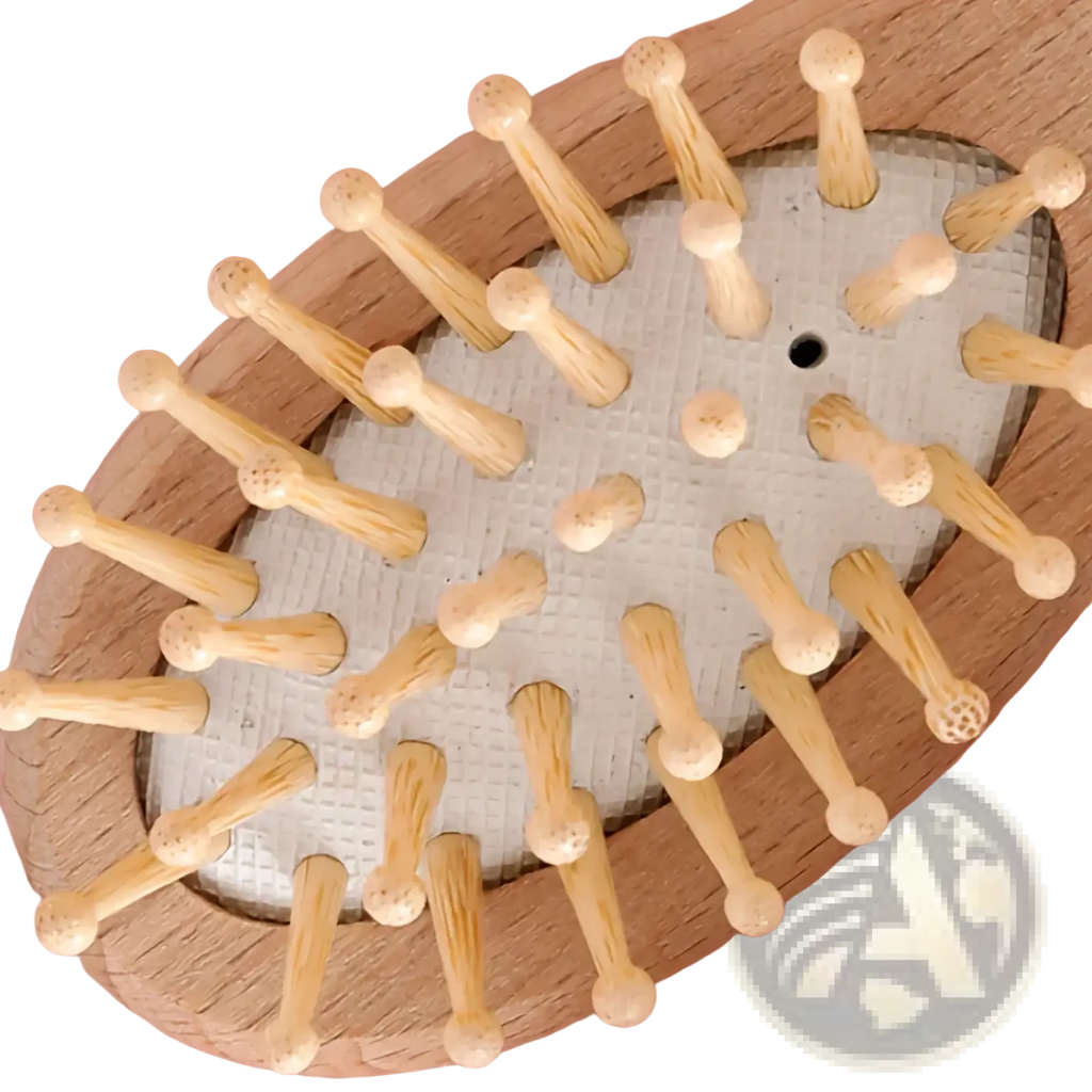 Wooden oval-shaped back massager with light bamboo bristles and textured white rubber base from baby wooden grooming set