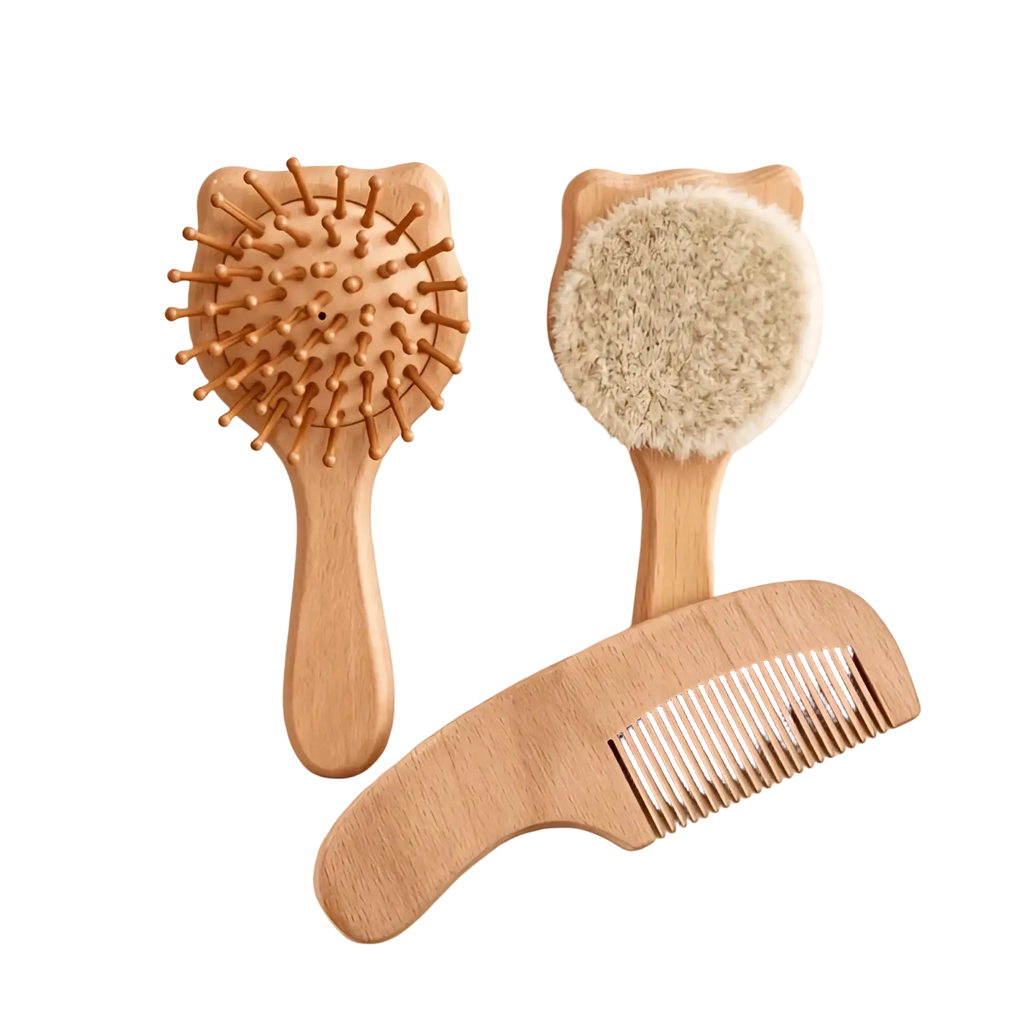 Set of three wooden baby hair care tools including round spiked brush soft-bristled scalp massager and ergonomic comb