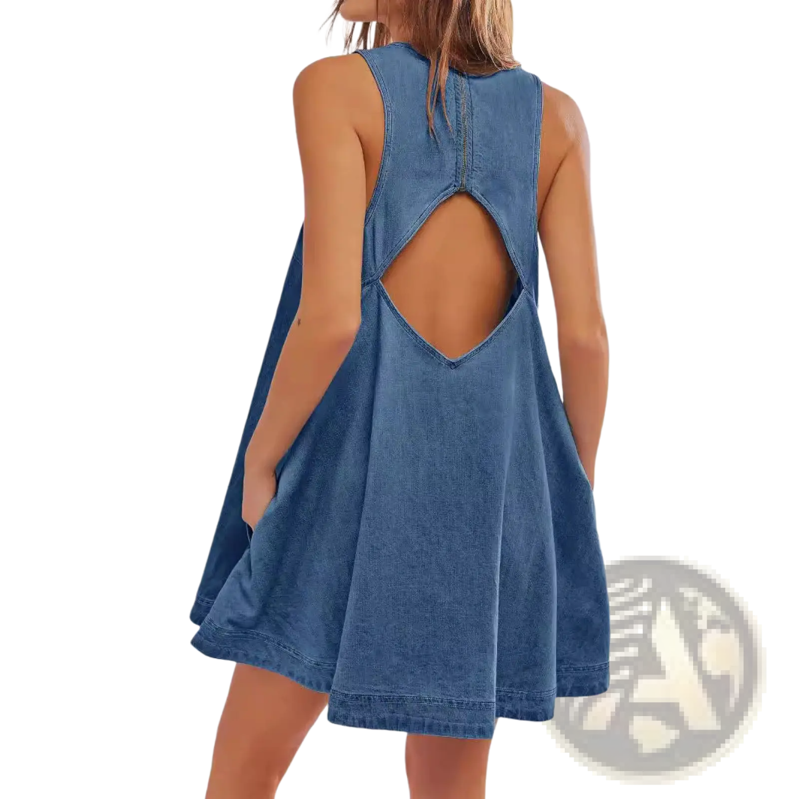 Blue denim mini dress shown from the back featuring a backless cutout and bow accent design