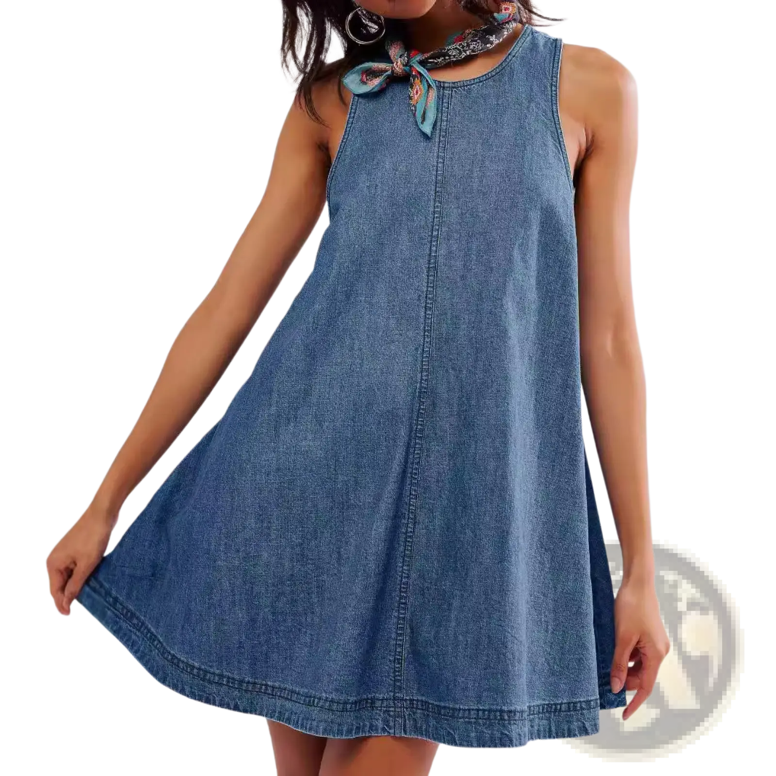 A sleeveless medium blue wash denim mini dress with a round neckline and patterned fabric tie bow accent
