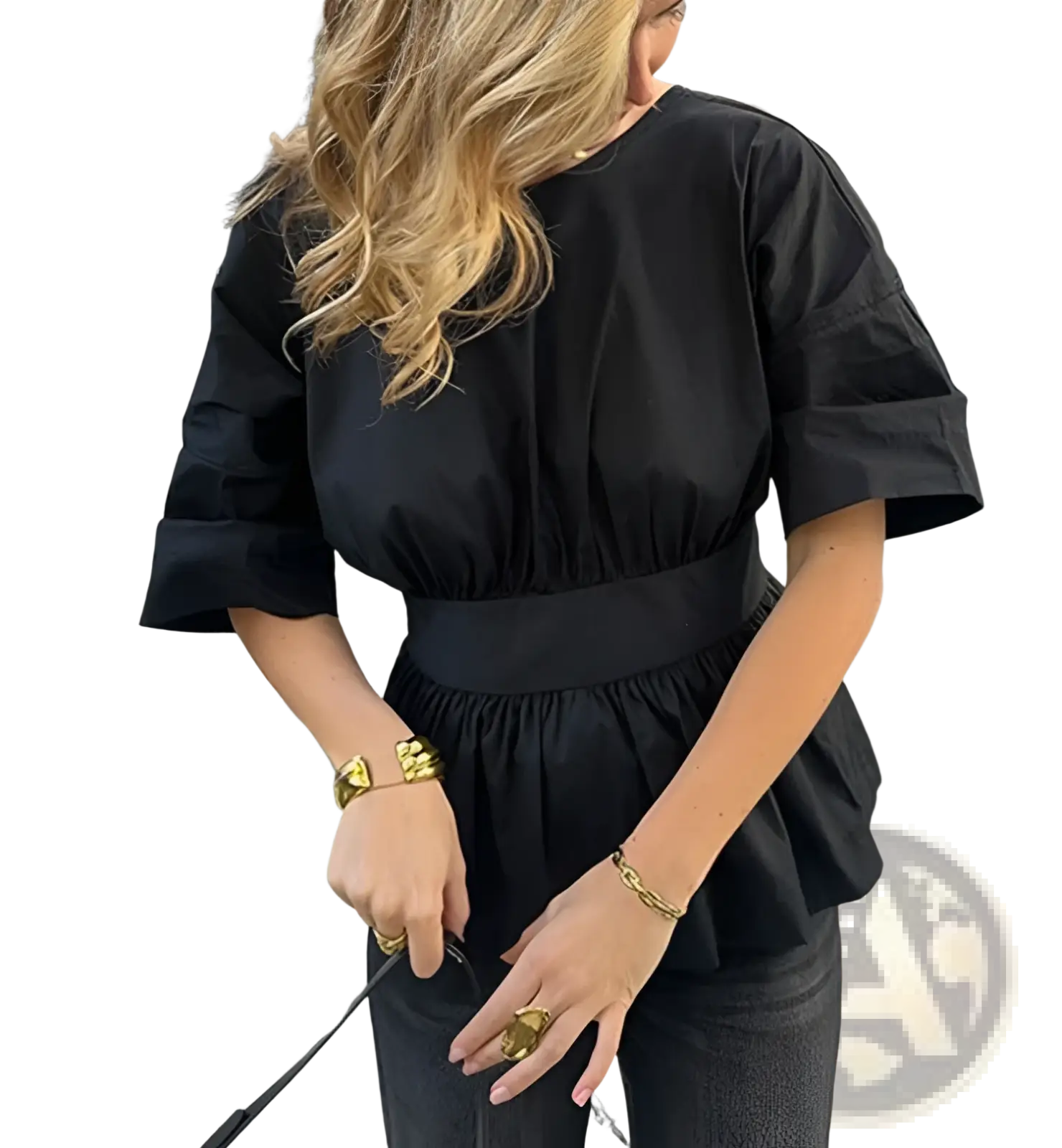Black cotton peplum top with puffed sleeves and cinched waistband shown from the back with tie back detail