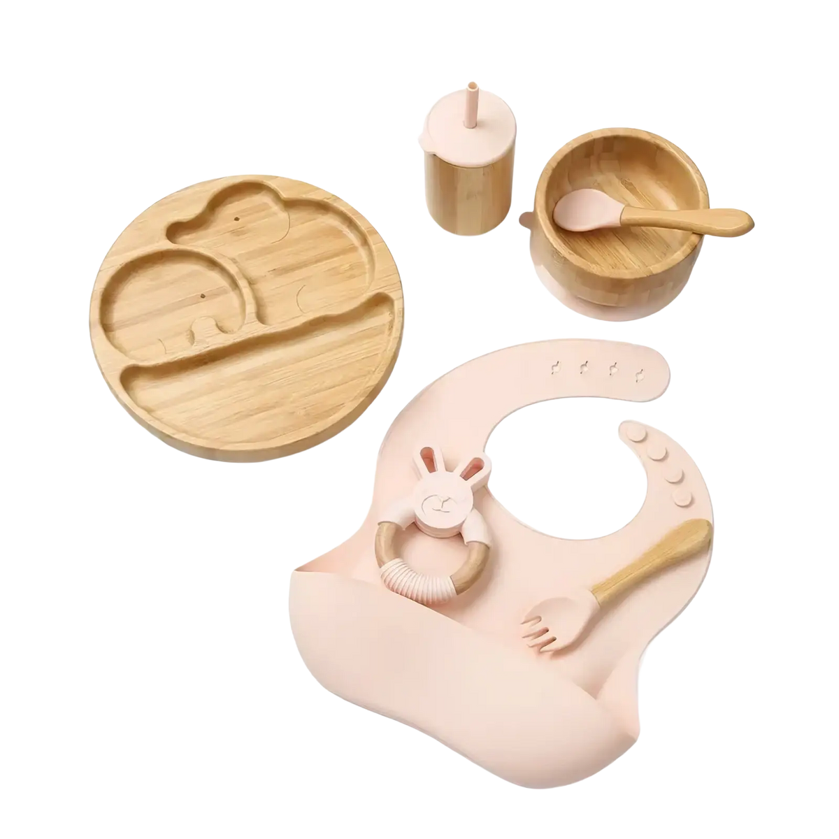 Pink silicone baby bib with wooden bunny teether and fork attached in bamboo baby feeding set with silicone tableware