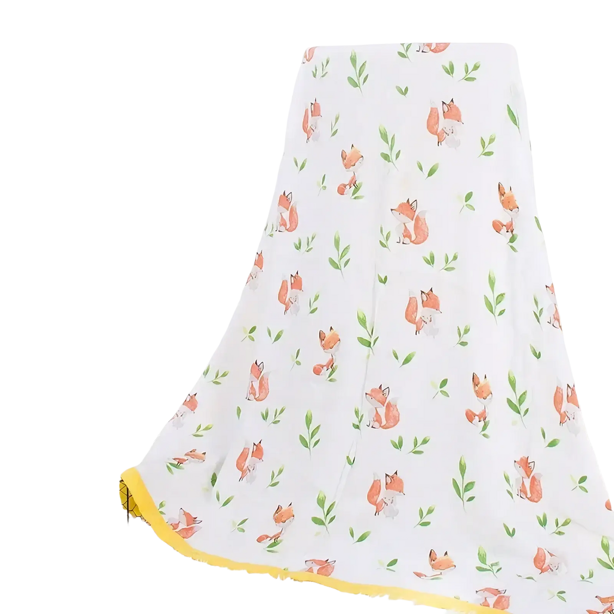 White bamboo cotton floral baby swaddle blanket with orange foxes green leaves and bright yellow border
