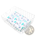 Bamboo cotton floral baby swaddle blanket with white fabric and teal gray umbrella raindrop cloud pattern in silver basket