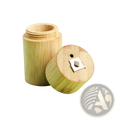 A bamboo pencil sharpener with natural wood grain finish and silver metal blade for bamboo floss tube case