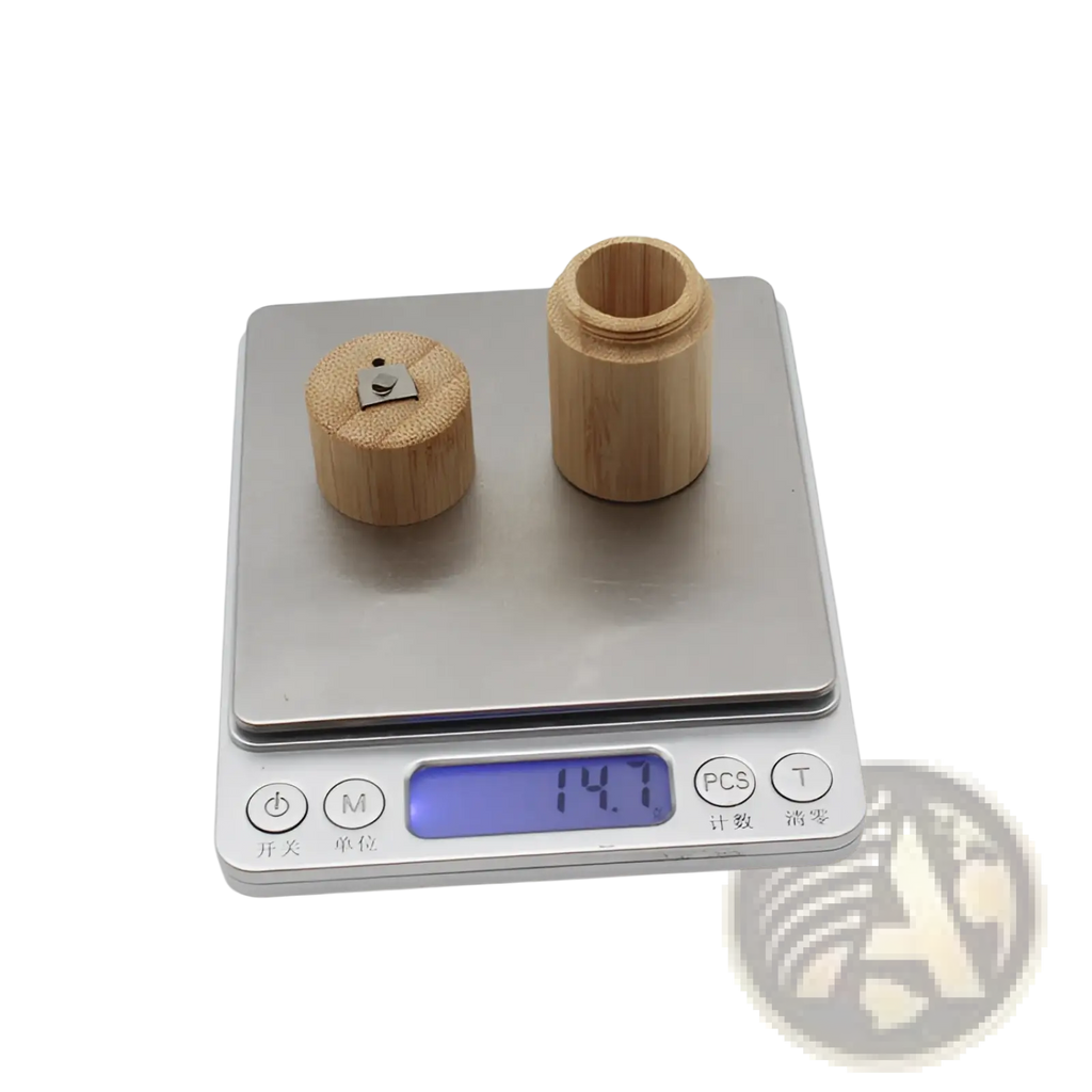 Light brown bamboo floss tube portable biodegradable case with matching lid and small metal clasp for secure closure