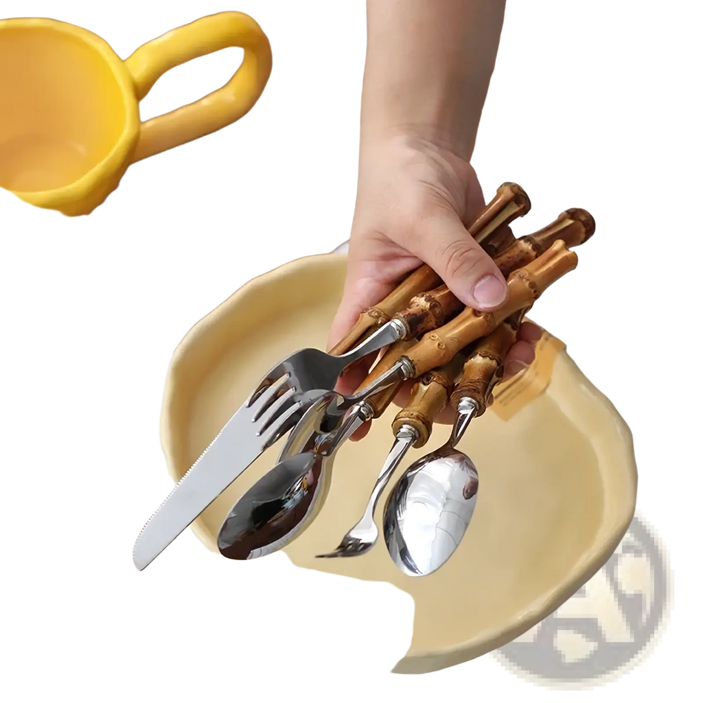 Bamboo handle stainless steel cutlery set with natural textured bamboo handles and polished metallic blades for dining