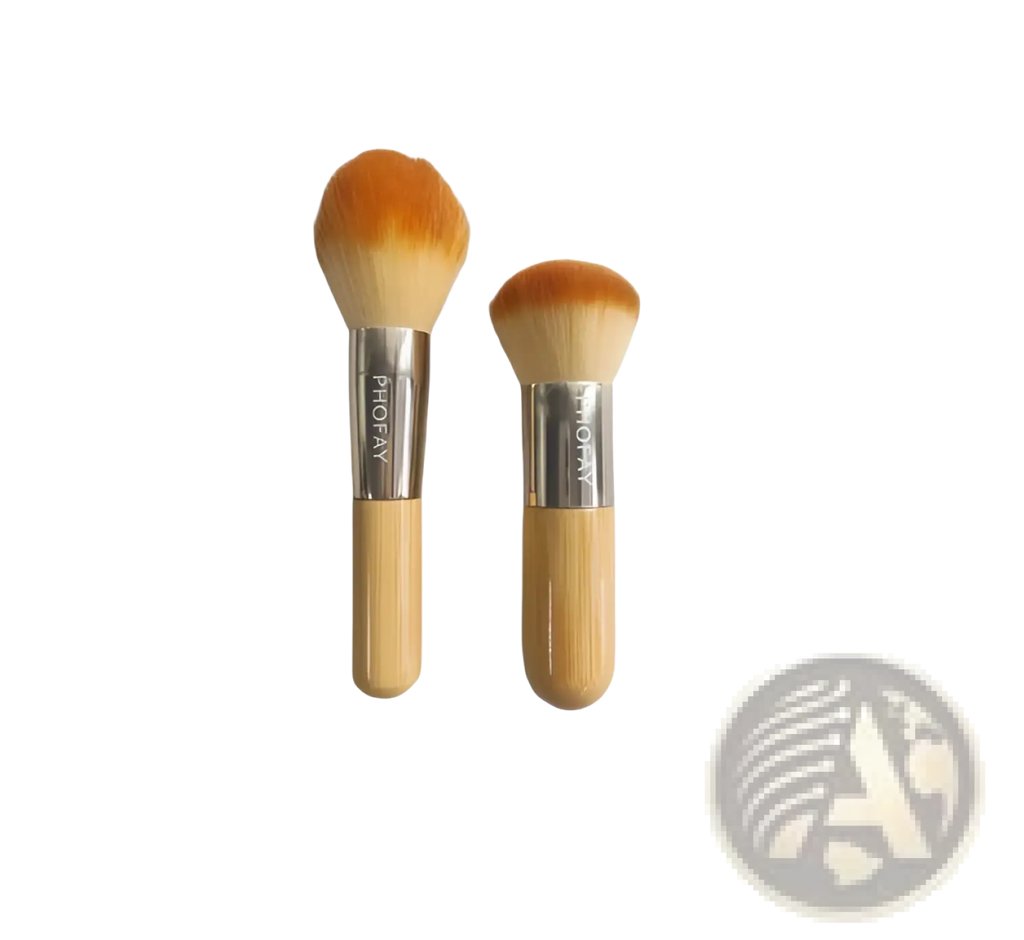Two bamboo-handled makeup brushes with silver ferrules and orange gradient soft tapered bristles