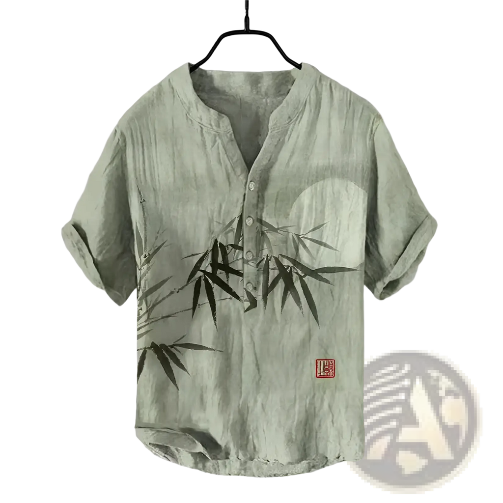 Light green men short sleeve button shirt featuring black bamboo leaf and circular print on front side
