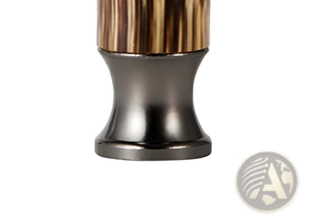 A bamboo safety razor retro manual shaving kit with a sleek polished dark metallic base and textured brown gold stripes