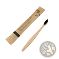 A natural bamboo toothbrush with black soft bristles in a biodegradable brown paper sleeve from a 10 pack set