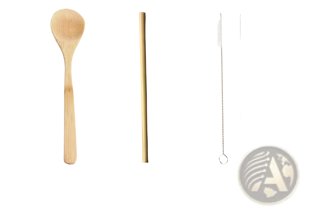 Light-colored bamboo spoon with smooth natural finish and rounded bowl from bamboo utensil set with checkered travel roll case