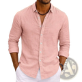 A soft pink bamboo viscose long sleeve shirt for men with subtle textured weave and white buttons