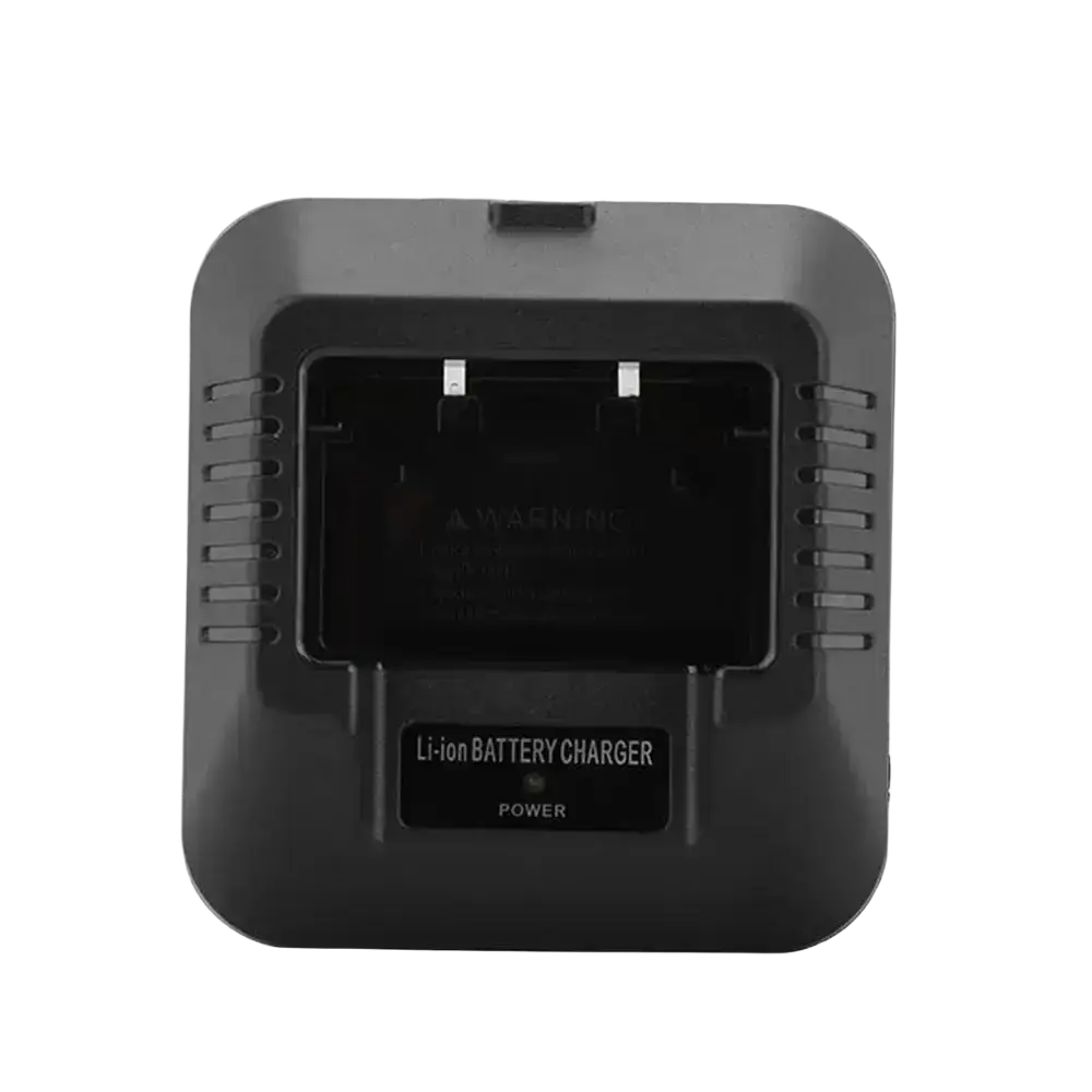 Black plastic baofeng uv-5r battery charger with rectangular battery slot and ventilation slits along the sides