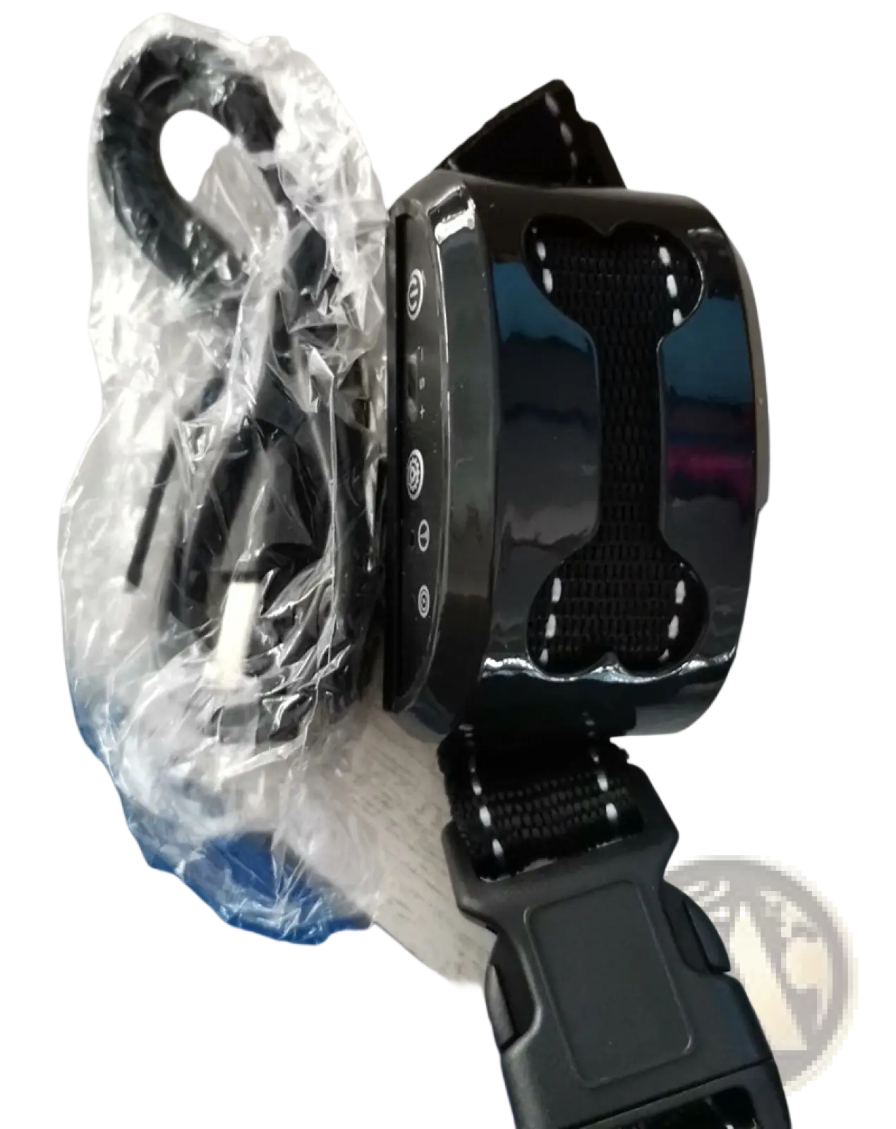 Black Barker Collar automatic dog training device with glossy plastic housing, bone-shaped cutouts, and adjustable fabric straps