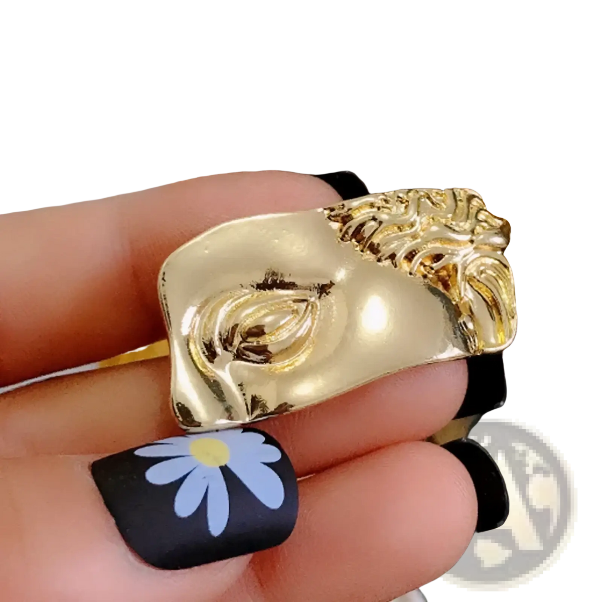 Gold-toned sculptural ring featuring a stylized face with intricate detailing and glossy finish baroque david art picture frame brooch