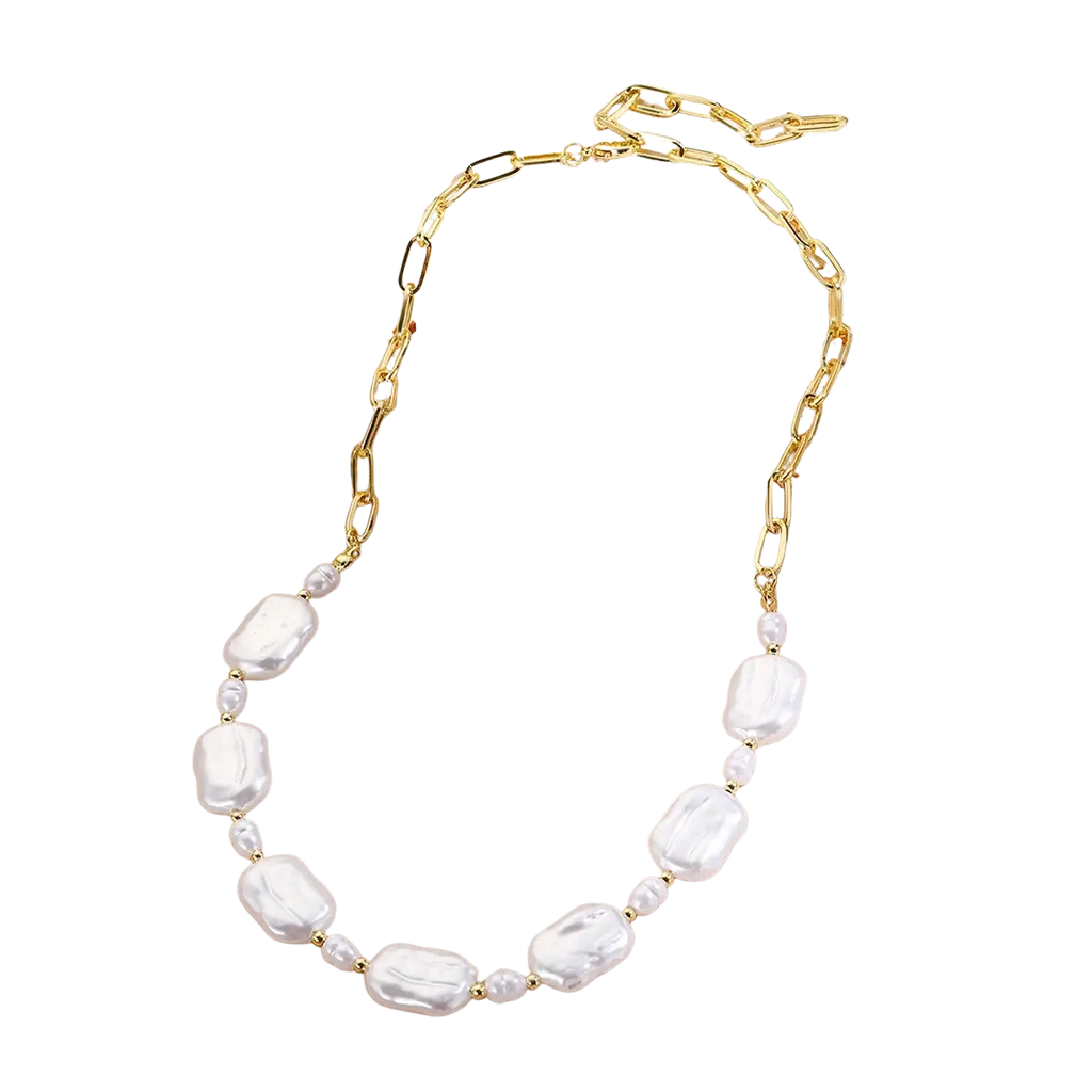 Baroque pearl gold chain necklace featuring irregular white pearls and smaller pearl accents in bohemian style