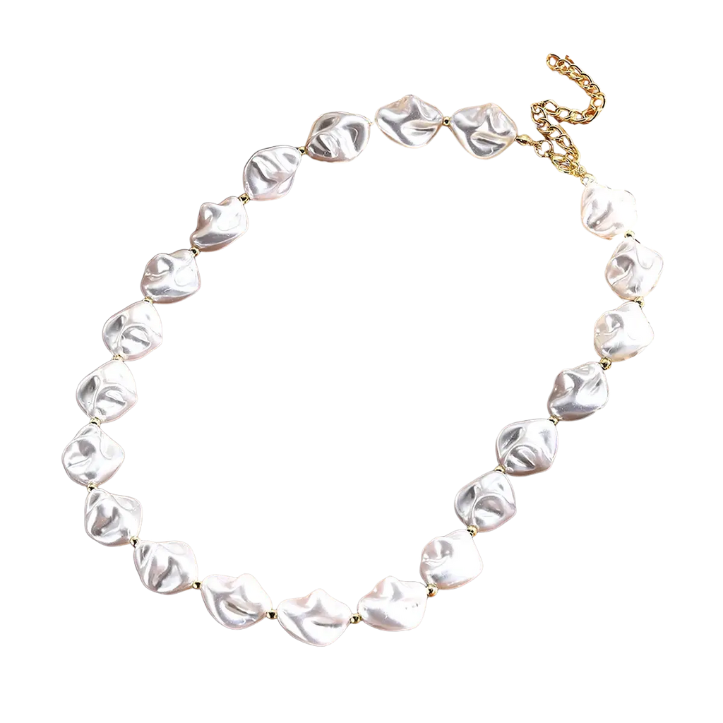 A delicate baroque pearl gold chain necklace featuring irregular white pearls and a gold-toned clasp