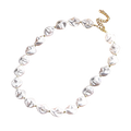 A delicate baroque pearl gold chain necklace featuring irregular white pearls and a gold-toned clasp