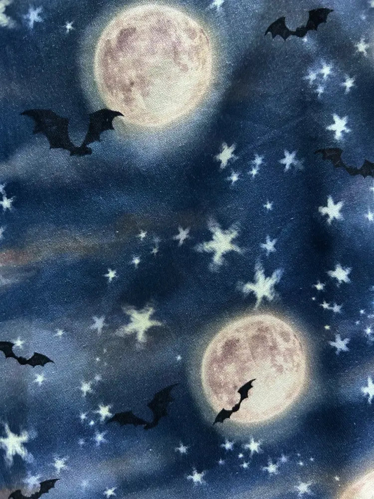 Navy bat and moon celestial pleated skater skirt in dark blue fabric with full moons stars and bats printed design