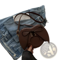 Brown bat wing heart crossbody bag with lace up front detail and adjustable strap for hands free use