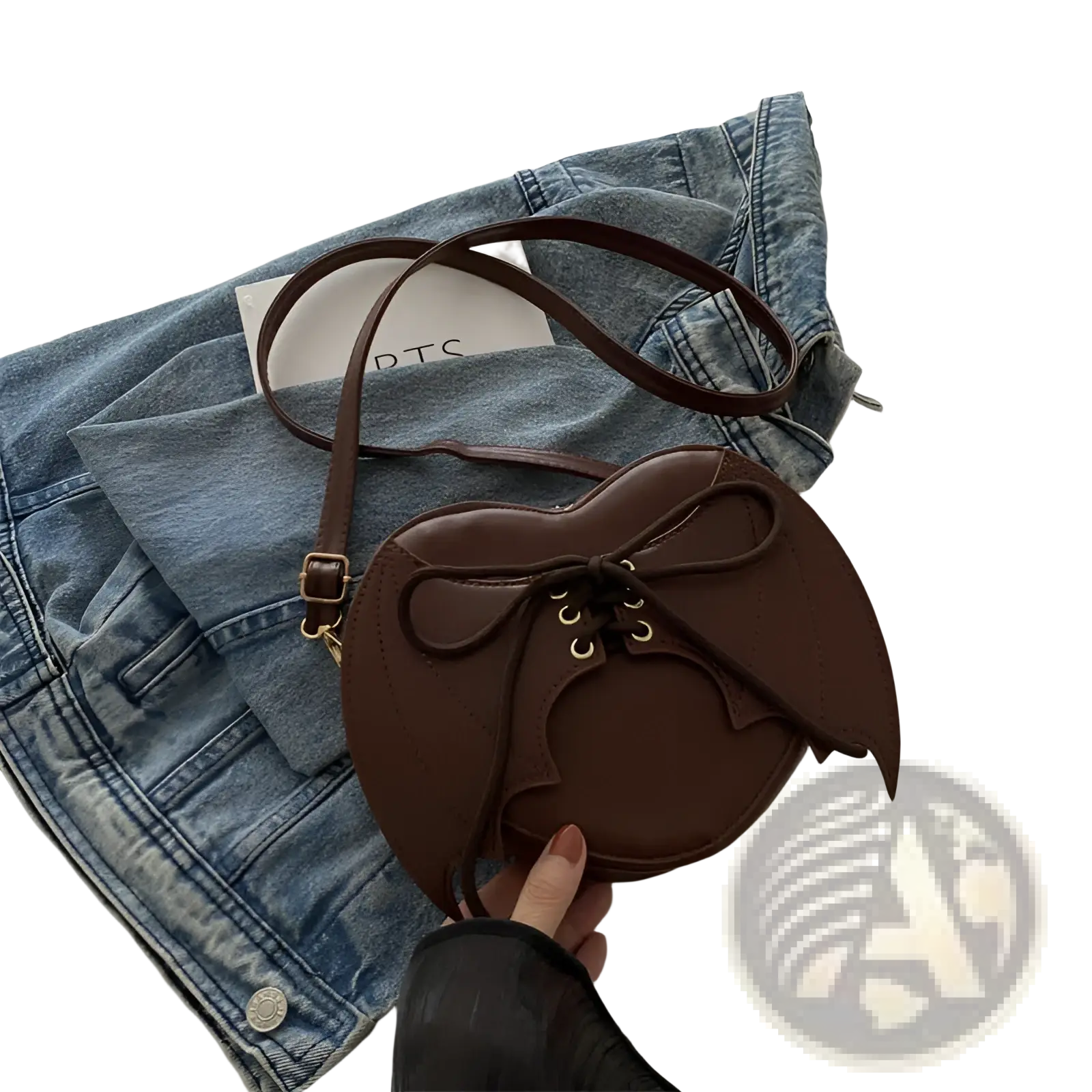 Brown bat wing heart crossbody bag with lace up front detail and adjustable strap for hands free use
