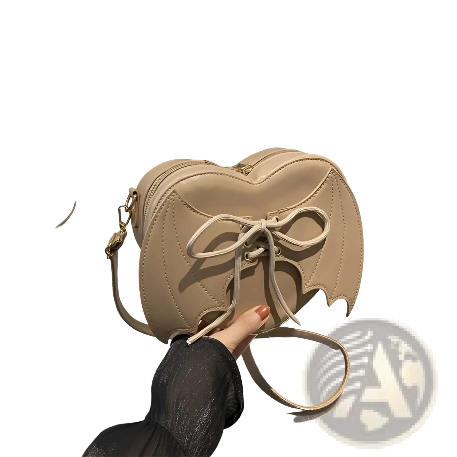 Beige heart-shaped crossbody bag with bat-wing design lace-up detail and matching bow tie accessory