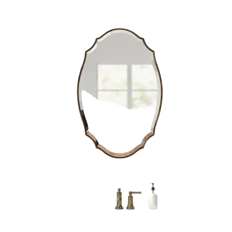 An oval bathroom mirror with a dark bronze ornate frame showcasing elegant mirrors style wall decor