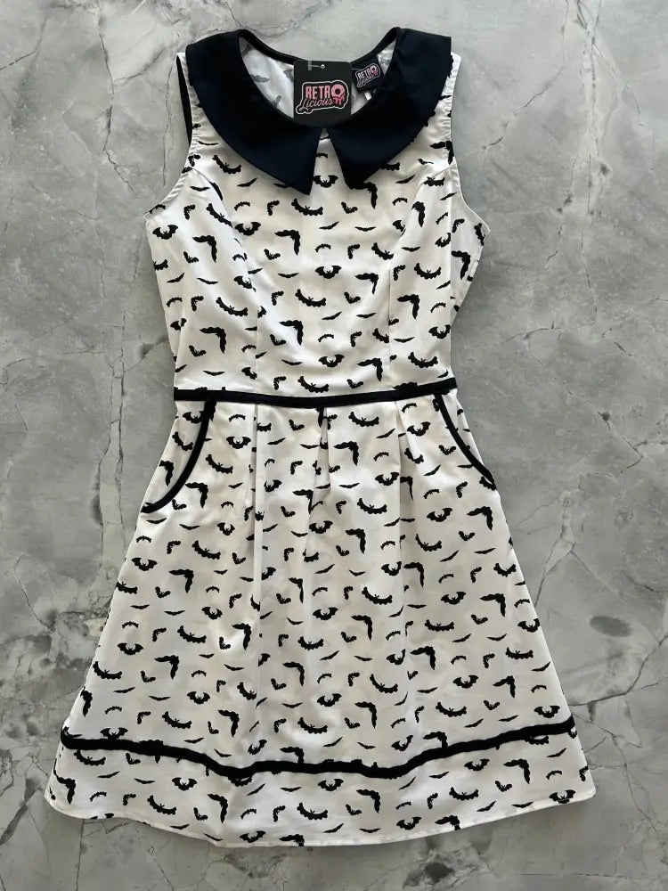 Retro bats print cotton a line dress in white with black peter pan collar and bat print featuring black waistband trim