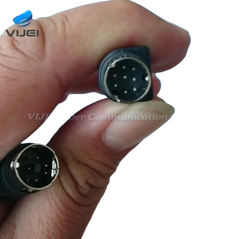 Black plastic battery charger cable connector with nine metallic pins for optical fiber fusion in fujikura fusion splicer