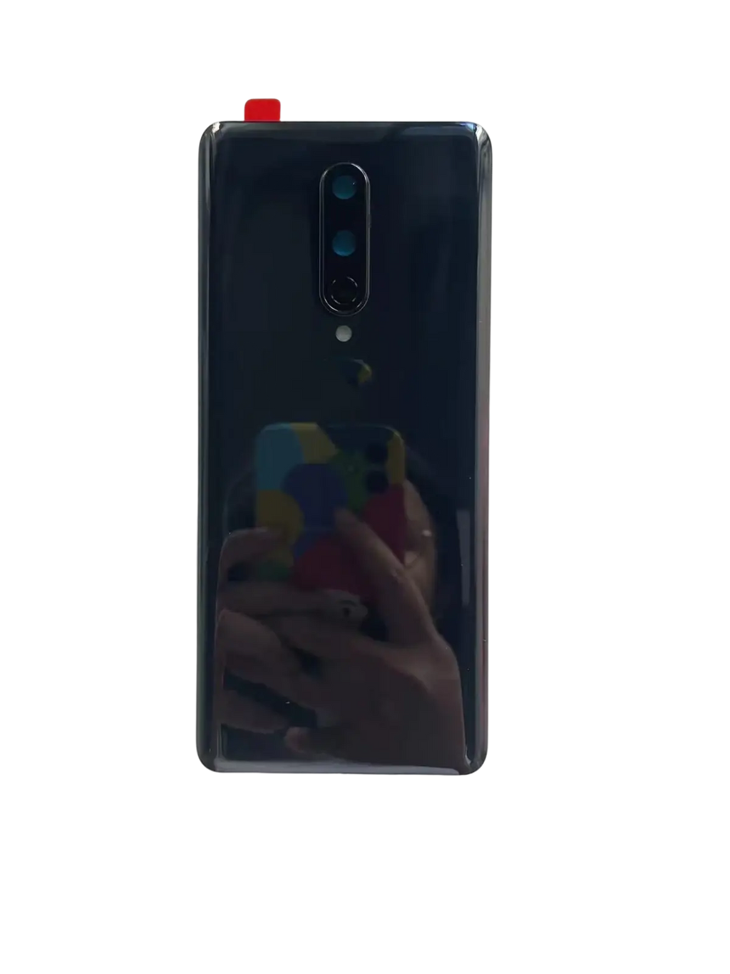 Black glossy back side of oneplus 8 pro with vertical triple-camera and brand logo battery cover hard gorilla glass