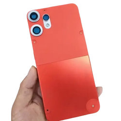Vibrant orange battery cover with adhesive backing for the back of nothing cmf phone 2 pro featuring three camera cutouts