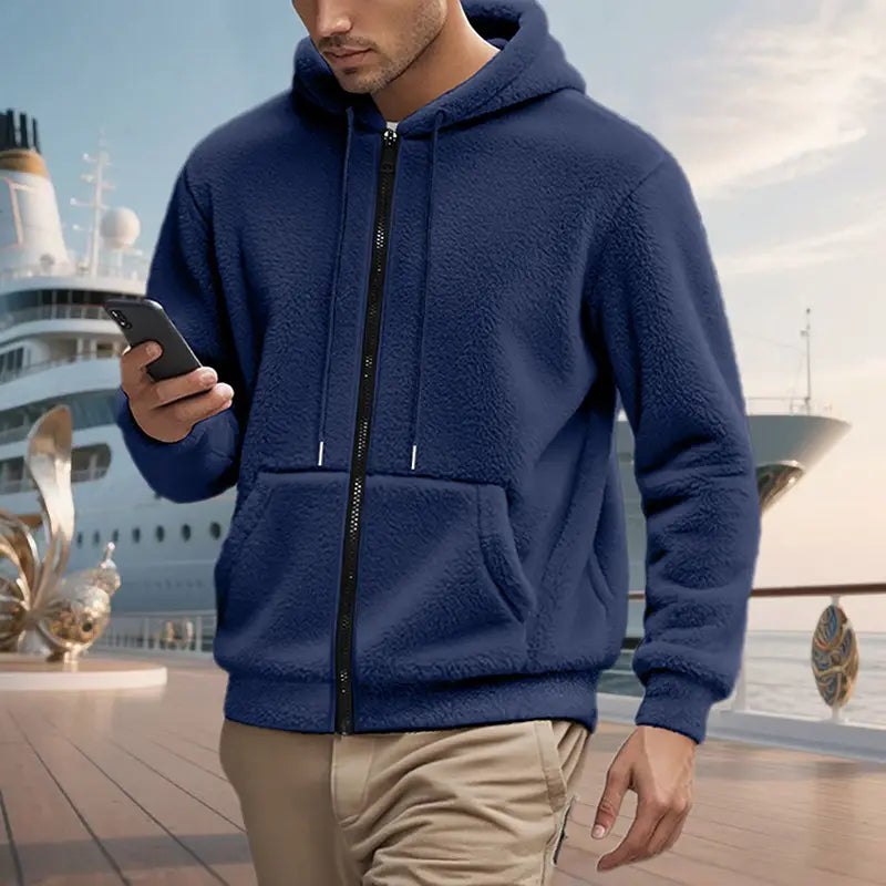 Men’s fleece-lined loose zip up hooded jacket in navy blue with black zipper and drawstrings made of soft fleece material.