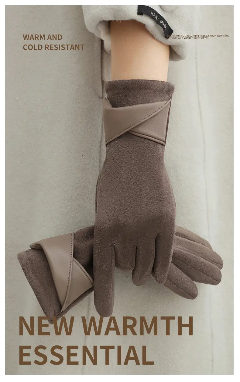 Brown suede touchscreen fleece lined bow gloves with a lighter brown leather strap on the back side designed for warmth and cold resistance
