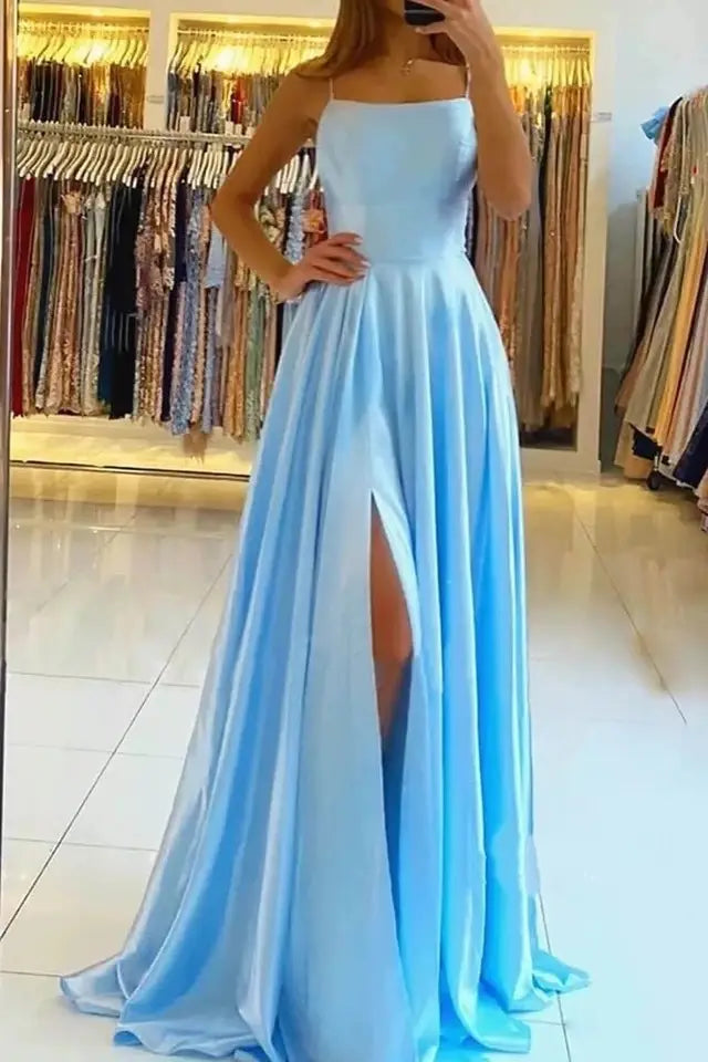 A flowing light blue satin split maxi evening dress prom gown with a square neckline and high slit.